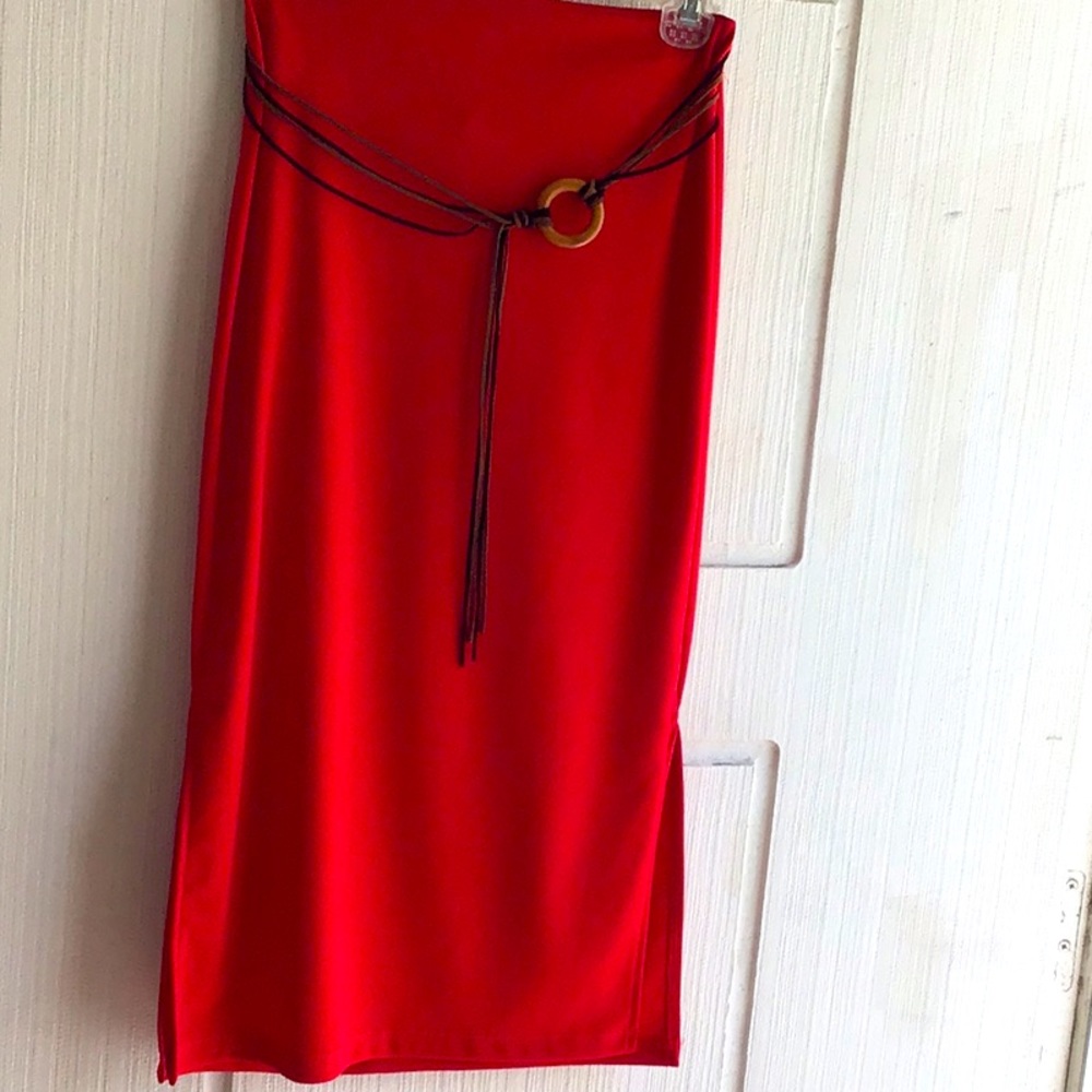 Red Slip On Skirt with Accent Straps in Front and Two Side Slits. Size Medium.
